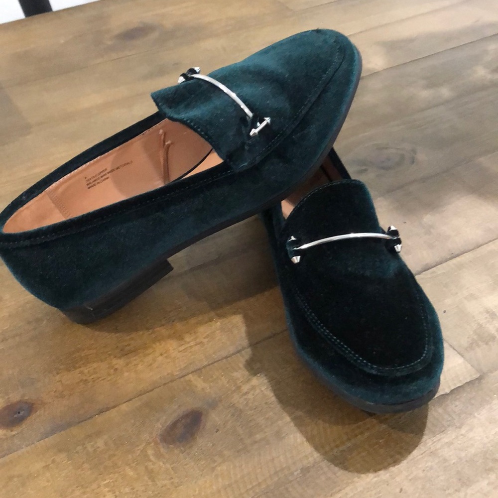 Emerald green velvet horsebilt loafers